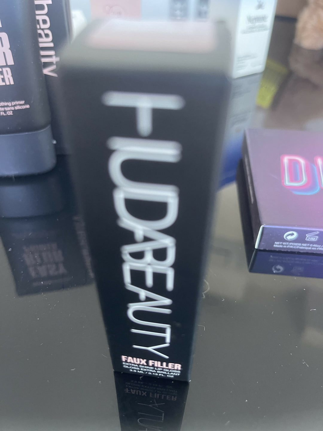 HUDA BEAUTY FAUXFILLER IN BOMBSHELL